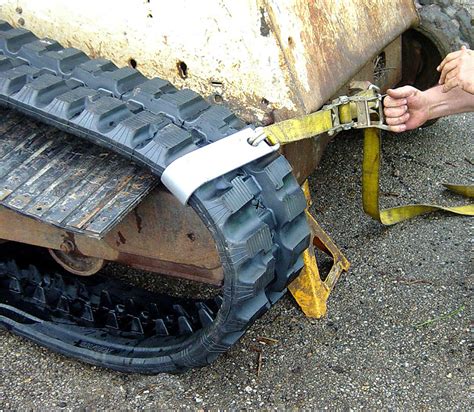 skid steer track replacement cost|replacing tracks on skid steer.